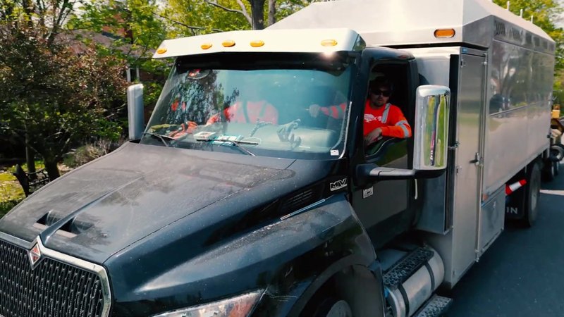 Tree King truck pulling up to a job